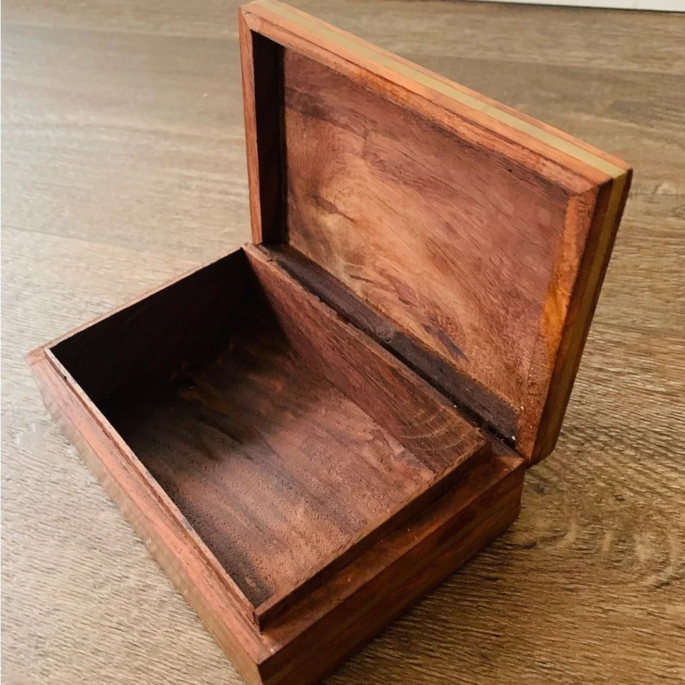vintage wooden box with metal file